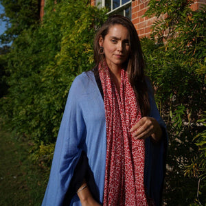 Mid Blue Cashmere Wrap Poncho as worn on model outside house