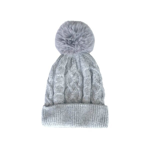 Flat lay of the silver grey knitted hat with faux fur bobble